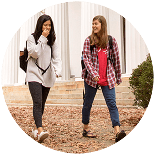 Two students walking outside